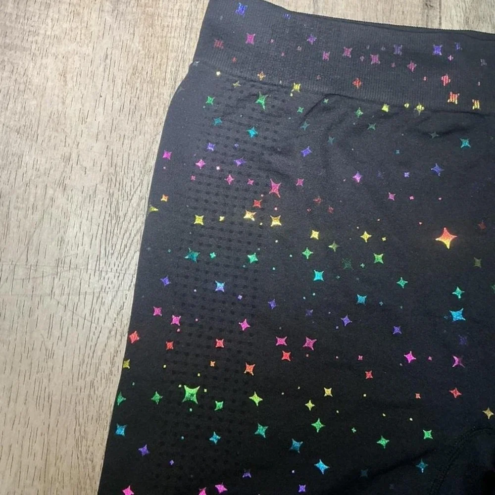 Black & multi-coloured star print bike shorts in a size L